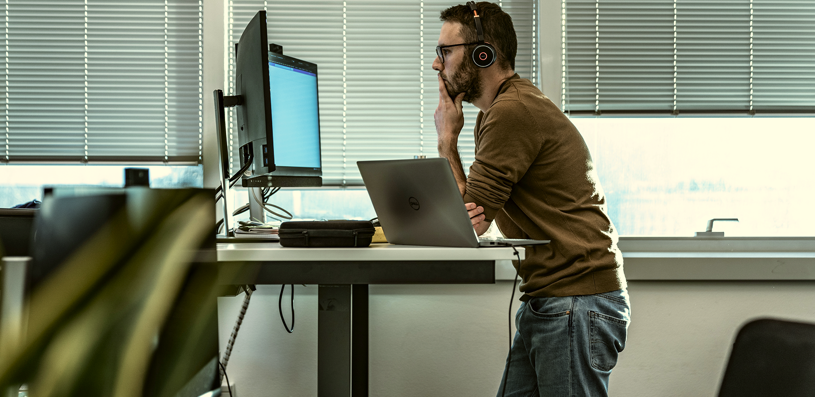 Datef IT School, Man thinking in front of a computer